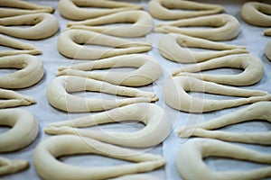 Fresh Pretzel or Brezel Dough on Wax Sheet