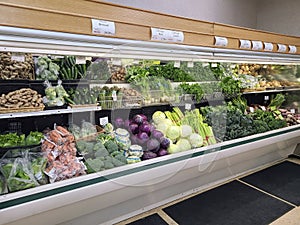 Fresh Produce Display with Organic Vegetables in Grocery Store, Eye-Level View