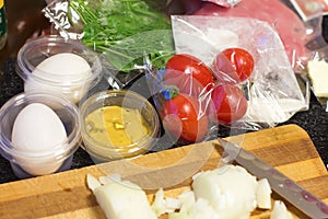 fresh products prepacked for salad. Tomatoes, sour cream, arugula.