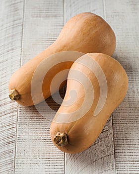 fresh pumpkin on a wooden background. The concept of healthy food, vegetables.