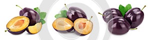 Fresh purple plum and slices with leaves isolated on white background with clipping path and full depth of field. Set or