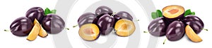 Fresh purple plum and slices with leaves isolated on white background with clipping path and full depth of field. Set or