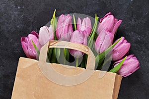 Fresh purple tulip flowers bag
