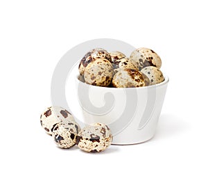 Fresh quail egg in a bowl isolated