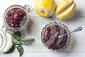 Fresh quince fruits and leaves and quince jam. (Turkish name ayva