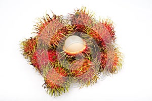 Fresh rambutans on white background