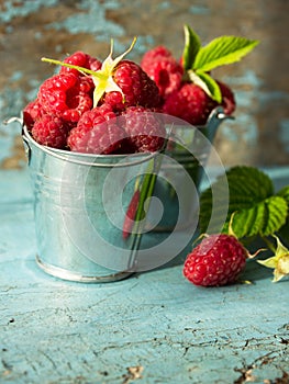 Fresh raspberries in vintage basket vitamins healthy food vegan ingredients. Selective focus