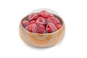 Fresh raspberries in wooden bowl isolated on white background. Red sweet raspberries