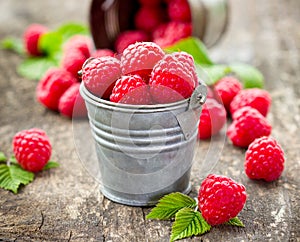 Fresh raspberry in the bucket