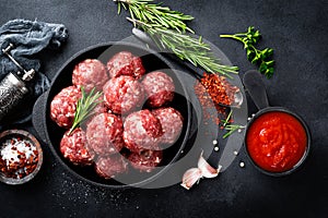 Fresh raw beef meatballs with spices