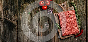 Fresh Raw Beef Minced Meat. Food recipe background. Close up. Long banner format. top view