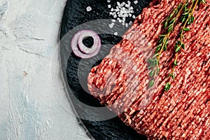 Fresh Raw Beef Minced Meat. Food recipe background. Close up. Long banner format. top view