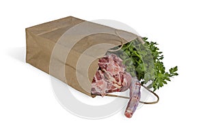 Fresh raw beef oxtail meat in paper bag isolated on white background