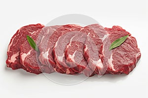 Fresh raw beef pieces arranged elegantly against pristine white background