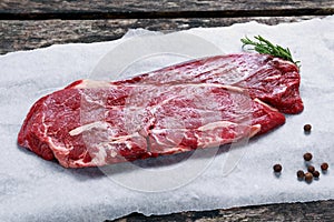 Fresh raw Beef Rump Steak on crumpled paper