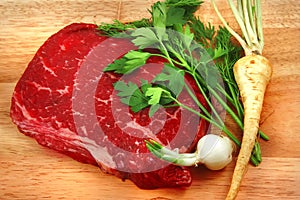 Fresh raw beef steak on cutting board
