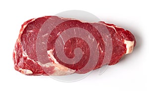 Fresh raw beef steak isolated on white, from above