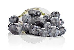 Fresh raw black grape isolated on white