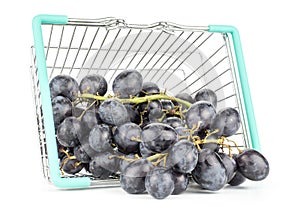 Fresh raw black grape isolated on white