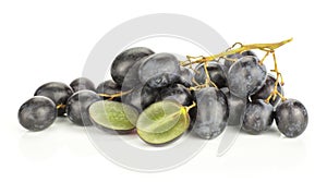 Fresh raw black grape isolated on white