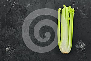 Fresh raw celery on black