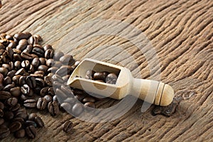 Fresh Raw Coffee Beans on Wooden Desk Table