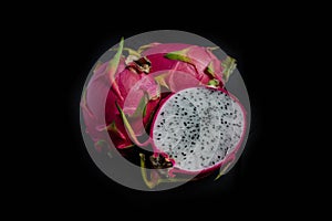 Fresh and Raw Dragon Fruit on iSolated Black background, Many Nutritions with Healthy Fruit for Diet.