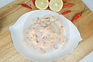 Fresh Raw Fat of Chicken on a White plate and seasoning