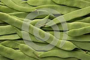 Fresh raw green flat beans full frame close up