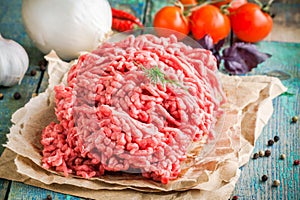 Fresh raw ground beef on a paper