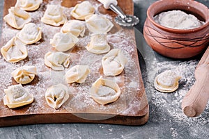 Fresh raw homemade tortellini or ravioli pasta