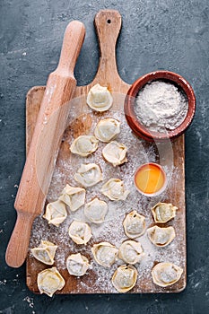 Fresh raw homemade tortellini or ravioli pasta