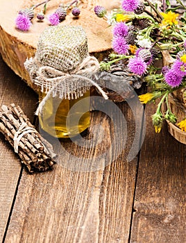 Fresh raw honey and wild flowers photo