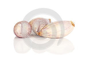 Fresh raw long shallot onion isolated on white