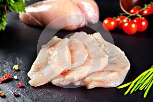 Fresh and raw meat. Chicken breast fillets cut ready for cooking