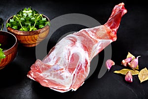 Fresh and raw meat. Leg of lamb uncooked , ready to grill and barbecue
