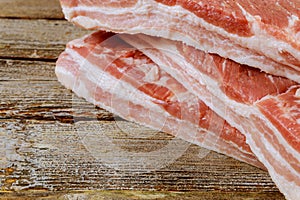 Fresh raw meat pork fresh pork chop bacon rustic wood background