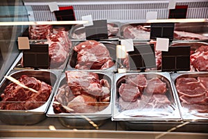 Fresh raw meat in refrigerator