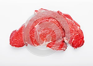 Fresh raw organic slice of braising steak fillet on white background