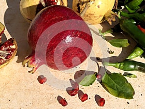 Fresh raw pomegranade fruit collected from the three photo