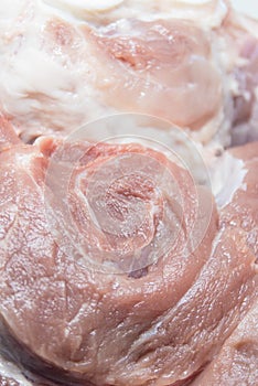 Fresh raw pork leg close up .