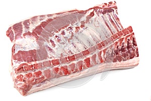 Fresh raw pork loin with ribs, isolated on white background