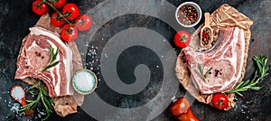 Fresh raw pork meat with ingredients ready for cooking on black table. Long banner format. top view