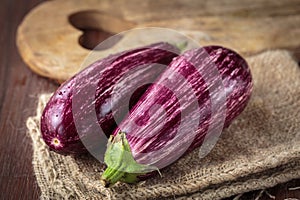 Fresh raw purple eggplants