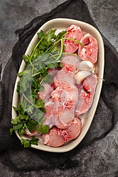 Fresh raw rabbit meat on dish