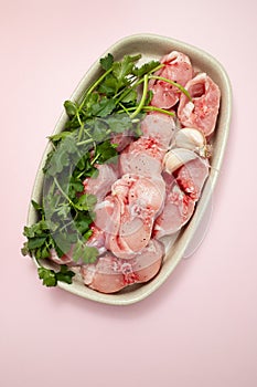 Fresh raw rabbit meat on dish