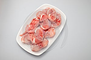Fresh raw rabbit meat on dish