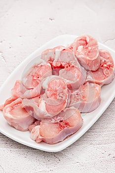 Fresh raw rabbit meat on dish