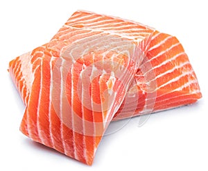 Fresh raw salmon fillets on white background