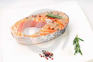 Fresh raw salmon steak isolated on white background